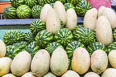 Khujand, Sughd Province, Tajikistan. Melons for sale at the Panjshanbe Bazaar in Khujand.