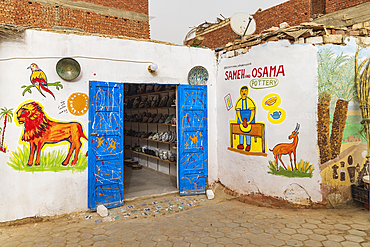 Faiyum, Egypt. February 19, 2022. Pottery shop decorated with murals in the village of Faiyum.