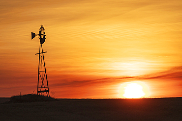 USA, Washington State, Whitman County. Windmill at sunset in the Palouse hills.