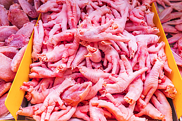 Chinatown, Manhattan, New York City, New York, USA. Raw chicken feet for sale in Chinatown.