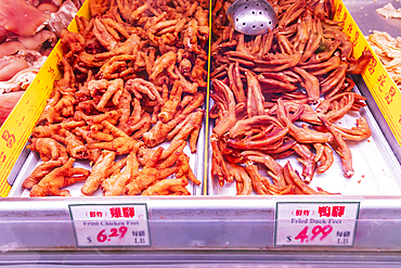 Chinatown, Manhattan, New York City, New York, USA. November 3, 2021. Fried chicken and duck feet for sale in Chinatown.