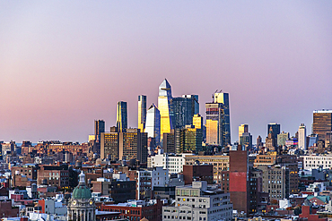 Manhattan, New York City, New York, USA. Sunset light on skyscrapers in Manhattan.