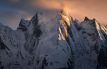 North and north-west faces of impressive and iconic granite wall in Swiss Alps: Pizzo Badile