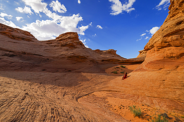 A girl admires the beautiful landscape of rock formations near the town of Page, Arizona, United States of America, North America