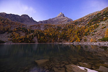 Braccia mountain at Lagazzuolo lake at sunrise in autumn, Chiesa di Valmalenco, Sondrio, Lombardy, Italy, Europe