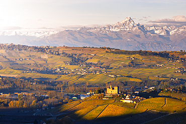 Grinzane Cavour and Monviso at sunrise during autumn, Cuneo, Langhe and Roero, Piedmont, Italy, Europe