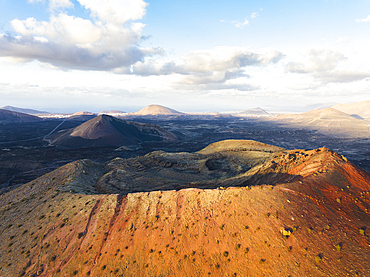 Aerial view of Caldera Colorada at sunset, Tinajo, Las Palmas, Lanzarote, Canary Islands, Spain, Atlantic, Europe