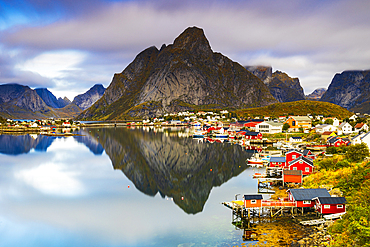 A long exposure to capture the sunrise in Reine Bay, during an autumn day, Reine, Moskenesoya, Lofoten Islands, Nordland, Norway, Scandinavia, Europe