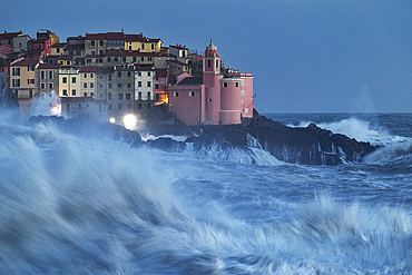 Big waves hit the famous fishing village of Tellaro during a strong sea storm, Lerici, La Spezia, Liguria, Italy, Europe