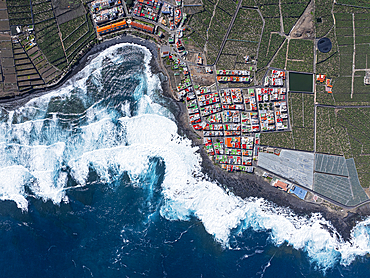 Vertical aerial view from the drone of a little coastal village with colorful roofs, Tenerife, Canary Islands, Spain, Atlantic, Europe