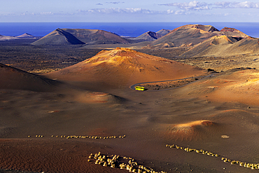 A bus in the middle of Timanfaya National Park, Yaiza, Tinajo, Las Palmas, Lanzarote, Canary Islands, Spain, Atlantic, Europe