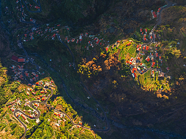 Aerial view from Eira do Serrado viewpoint of mountains and valley at sunset, Curral das Freiras, Camara de Lobos, Madeira region, Portugal, Europe
