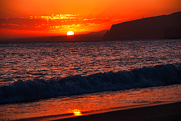 Romantic sunset over the sea and coastal landscapes in Almeria, Spain.