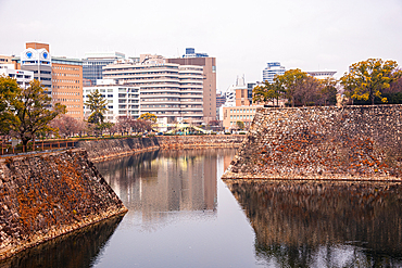 Overlooking the moats and outer Walls of Osaka Castle in Japan