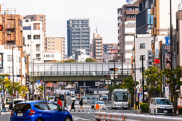 Busy intersection in Nipponbashi Denden Town Osaka, Kansai, Japan