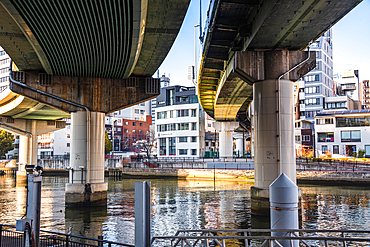 Nakanoshima in Osaka, Japan. A green Island park in the center of Osaka. Highway bridges over Dojima River in Osaka.