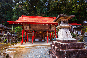 Shinto shrine and stone lantern at Ryuan-ji. Minoh National Park near Osaka, Kansai Japan