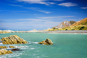 Turquoise Coastal Waters Framed by Rocky Headlands and Hills at Ward Beach, Marlborough, New Zealand