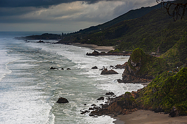Overcast View of Rugged West Coastline and Wave-Lashed Rocks Near Punakaiki, Paparoa National Park, New Zealand