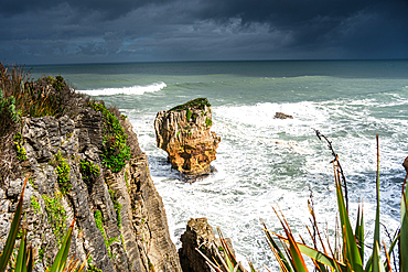 Sharp Limestone Cliffs with Isolated Sea Stack at Pancake Rocks, Punakaiki, Paparoa National Park, West Coast, New Zealand