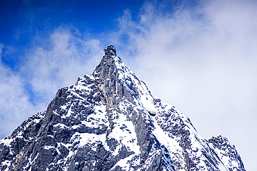 Massive Snow-Capped Face of Langtang Lirung (7,227 m) Towering Over the Valley as Seen from Kyanjin Ri Summit in Nepal