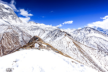 Snowy Ridge Leading Up to the Summit of Kyanjin Ri with Panoramic Views of the Langtang Himalayas and Pristine Valleys Below