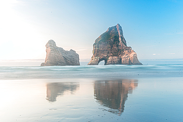 Soft pastel light Archway Islands Wharariki Beach New Zealand Wharariki Beach, Golden Bay, New Zealand.