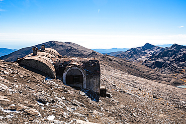 Weathered mountain hut on the high plateau Sierra Nevada National Park, Andalusia, Spain. A relic of mountaineering and historical use in the 20th century.