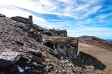 Ruins of a stone refuge and civil war mountain shelter high in the Sierra Nevada mountains of Andalusia, Spain.
