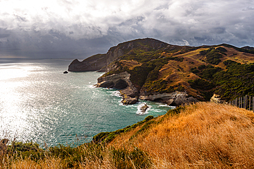 Rugged cliffs and ocean views create a dramatic landscape at Cape Farewell, the northernmost headland of the South Island, New Zealand.