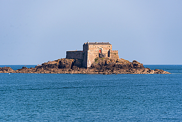 tone fortress of Fort National surrounded by ocean near the walled city of Saint-Malo, Brittany, France