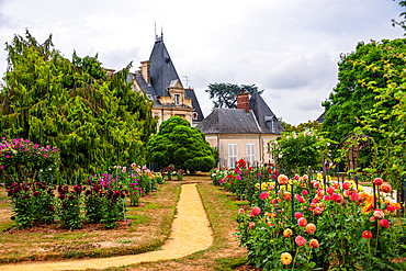 Thabor Gardens with blooming flowers and scenic paths leading to pavilion in Rennes Brittany France
