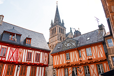 ibrant half-timbered houses with Saint-Pierre Cathedral spire in historic Vannes Brittany France