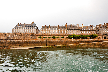 Saint Malo city walls and historic granite buildings seen from the sea in Brittany France