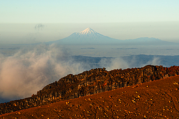 Volcanic landscape view on the far away Taranaki Volcano, viewed from Tongariro National Park, UNESCO World Heritage Site, North Island, New Zealand, Pacific