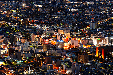 Aerial of city centre skyline at night, Hakodate, Hokkaido, Japan, Asia