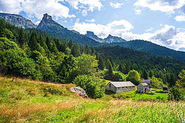 Alpine village with mountains of the Alps on the horizon, Alpe Devero Area, Italian Alps, Italy, Europe