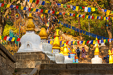 Small white stupas with face and golden top, Bhagwan Pau Swayambhu Stupa, Kathmandu, Nepal, Asia