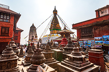 Blue sky and prayer flags at large Swayambhu (Swayanbhunath) Stupa, UNESCO World Heritage Site, Kathmandu, Nepal, Asia