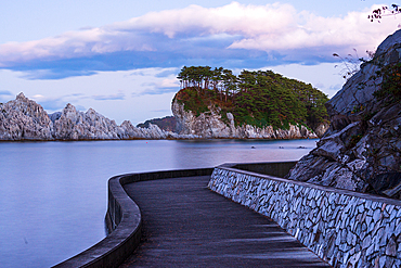 Path leading to the sea with rock formations and islands after sunset, Jodogahama, Iwate prefecture, Honshu, Japan, Asia