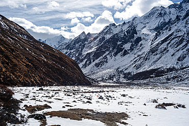 View over the plains of high altitude winter valley on the Langtang trek in Kyanjin Gompa, Himalayas, Nepal, Asia