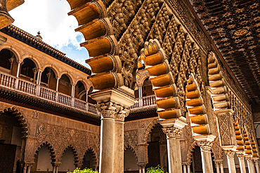 Patio de las Doncellas (Courtyard of the Maidens) with Arabesque Mudejar plasterwork, Alcazar of Seville, UNESCO World Heritage Site, Seville, Andalusia, Spain, Europe