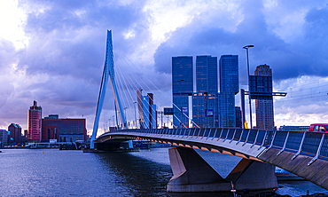 Blue hour with sunset light and modern skyline at River Mass with Erasmus Bridge, Rotterdam, The Netherlands, Europe