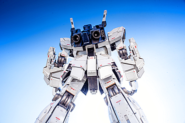 The life-sized Unicorn Gundam statue, Odaiba, against a blue sky, Tokyo, Honshu, Japan, Asia