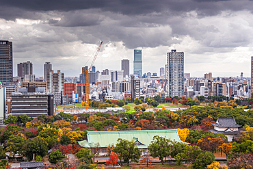 View from Osaka Castle over Nishinomaru Garden and skyline in the background, Osaka, Honshu, Japan, Asia