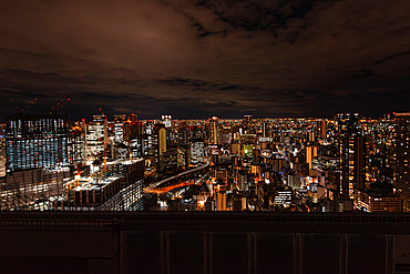 View from Umeda Sky Building of the city skyline at night, Osaka, Honshu, Japan, Asia