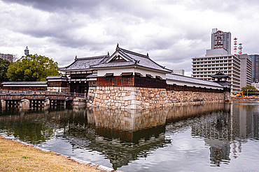 Castle moat and city, Hiroshima, Honshu, Japan, Asia