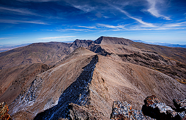 View from the summit of Pico del Veleta, with faults leading to Mulhacen, Sierra Nevada, Granada, Andalusia, Spain, Europe