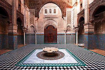 Al-Attarine Madrasa in the Medina of Fes, Morocco. Beautiful interior architecture and Islamic mosaic art.