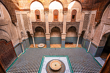 Al-Attarine Madrasa in the Medina of Fes, Morocco. Beautiful interior architecture and Islamic mosaic art.